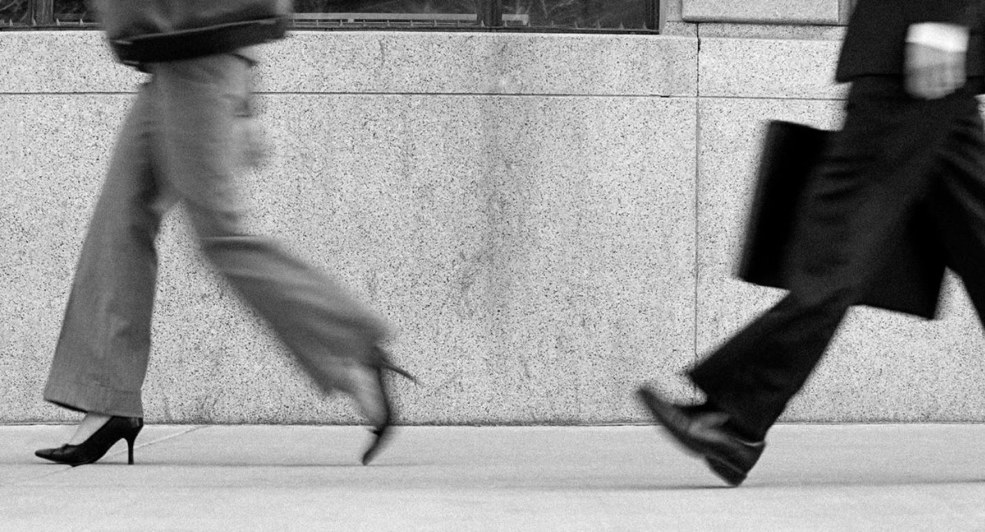 People walking purposefully in a city